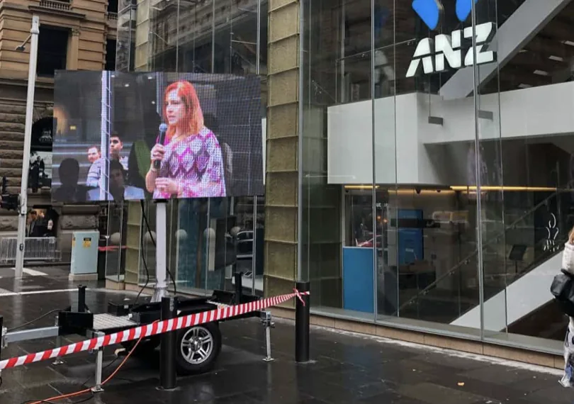 MOBO LED screen trailer running a live broadcast at a downtown city event