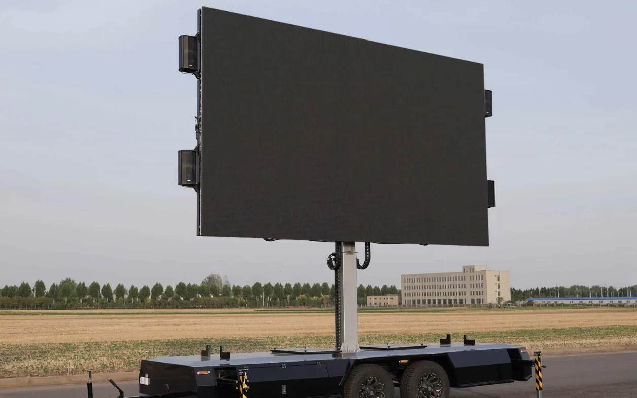 MOBO MB-15 LED screen trailer with 17 by 10 foot screen raised on a tandem-axle chassis