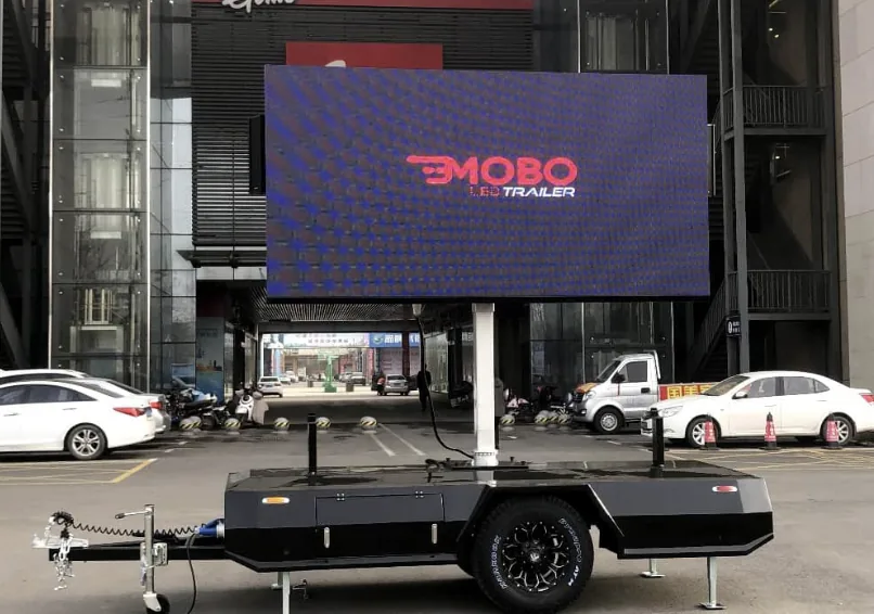 MOBO MB-5 deluxe LED screen trailer with side-mounted speakers and screen raised