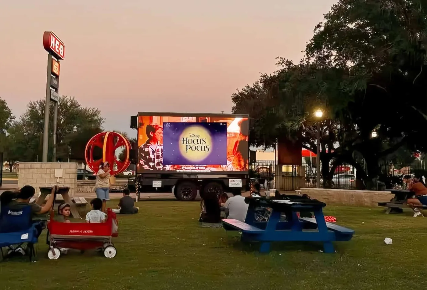 MOBO MB-10 LED screen trailer playing an outdoor movie night at a Texas park