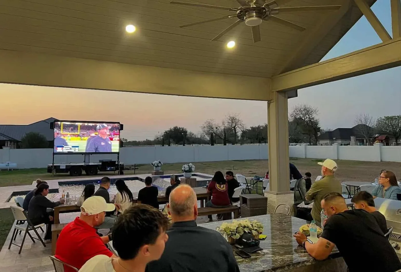 MOBO MB-10 LED screen trailer broadcasting live sports for a backyard party