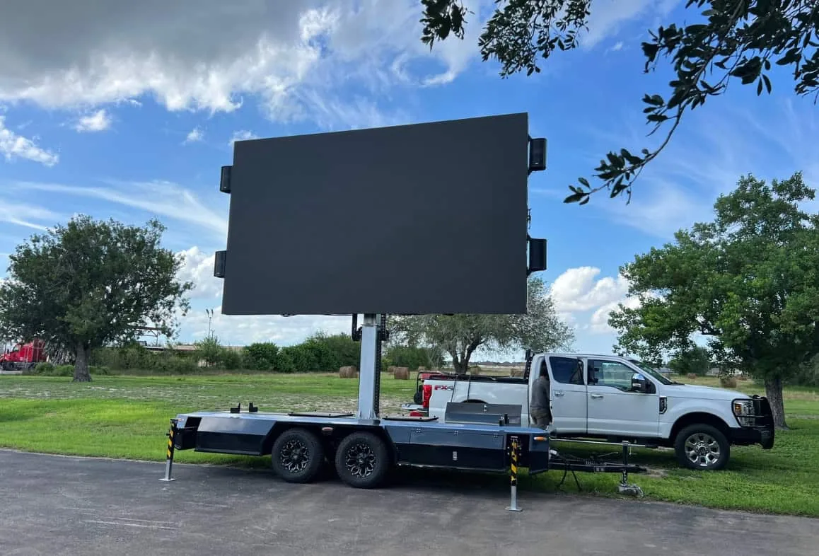 MOBO MB-15 LED billboard trailer deployed in Texas with a pickup