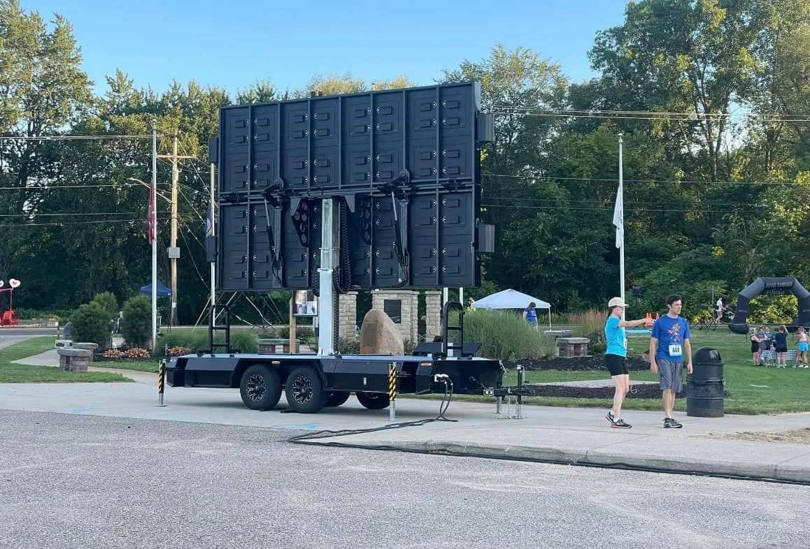 Rear of a MOBO MB-15 LED screen trailer serving a marathon event in the USA