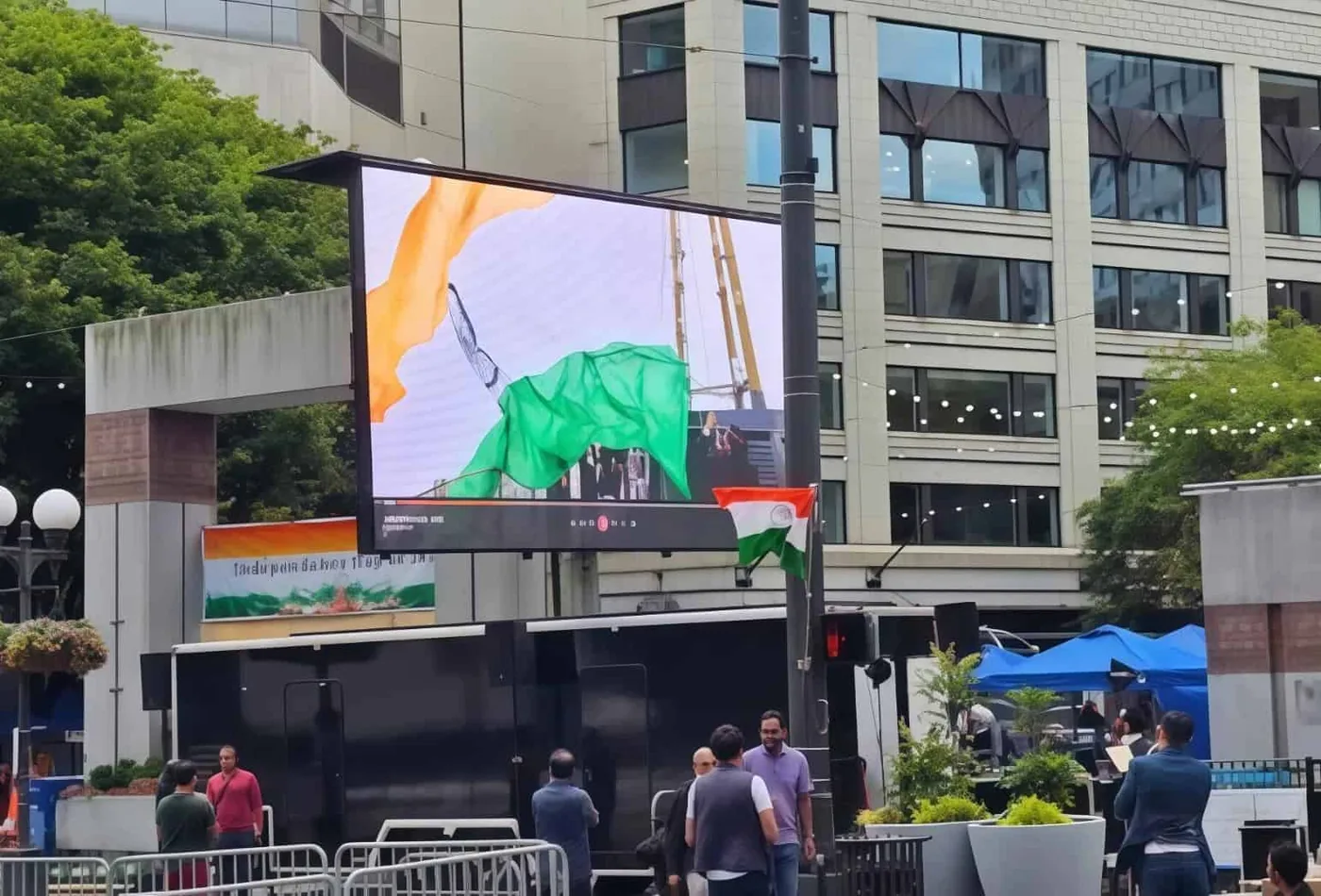 MOBO MB-22E enclosed LED screen trailer at a downtown Seattle celebration