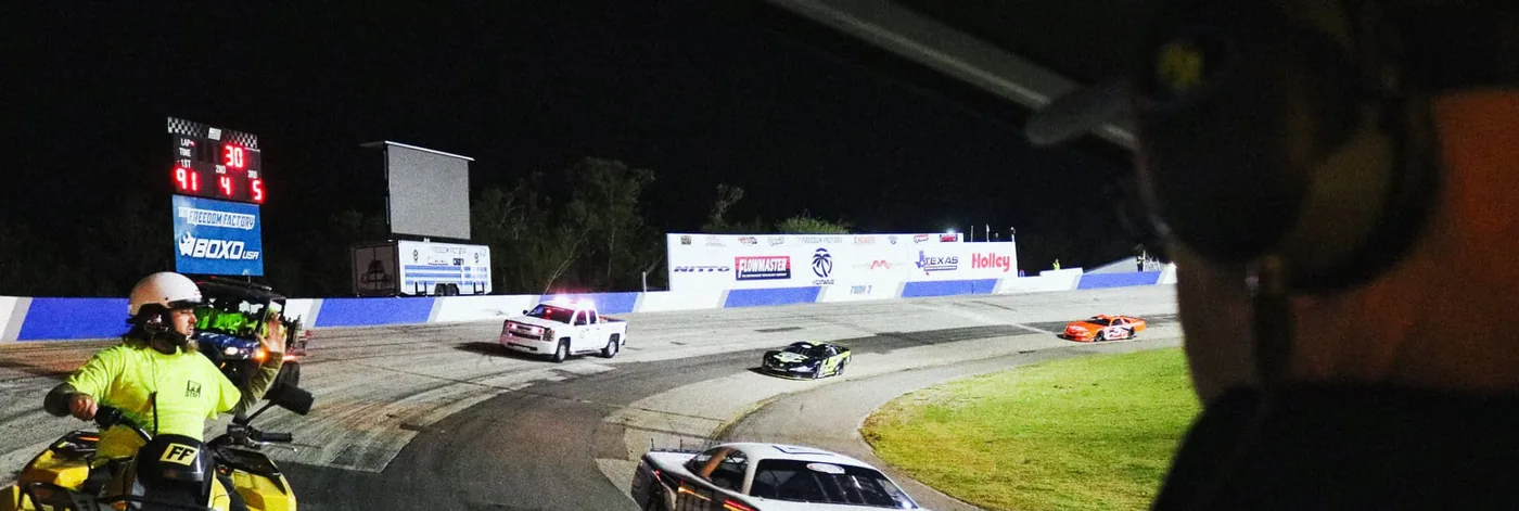 MOBO MB-22E enclosed LED screen trailer at a night race broadcast