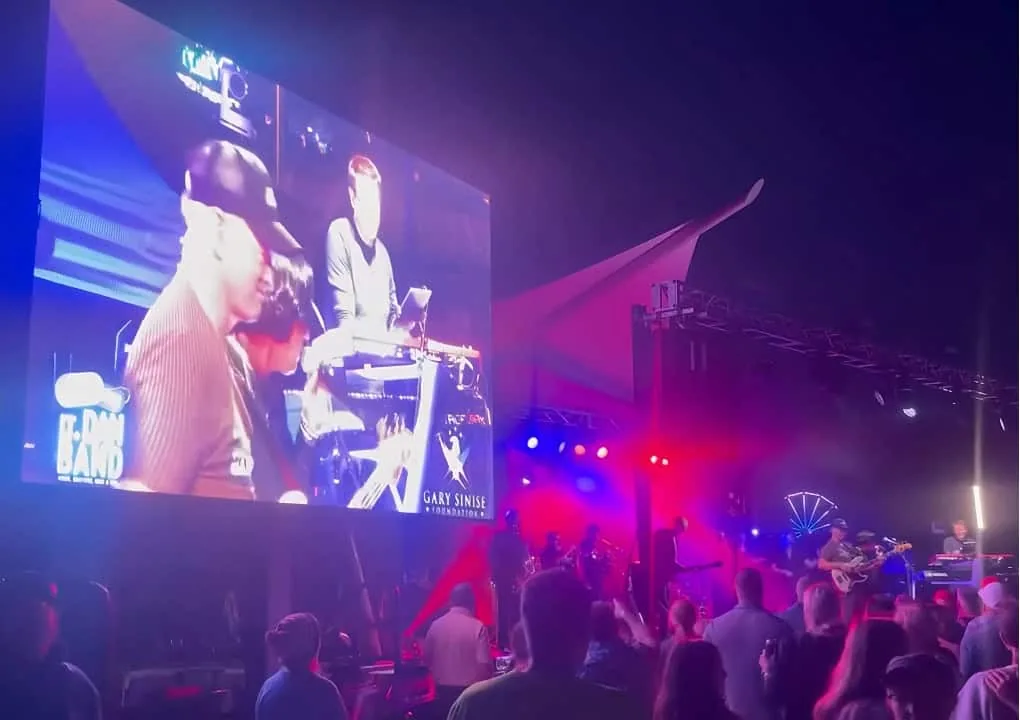 MOBO MB-28 class LED screen trailer broadcasting a live festival stage at night