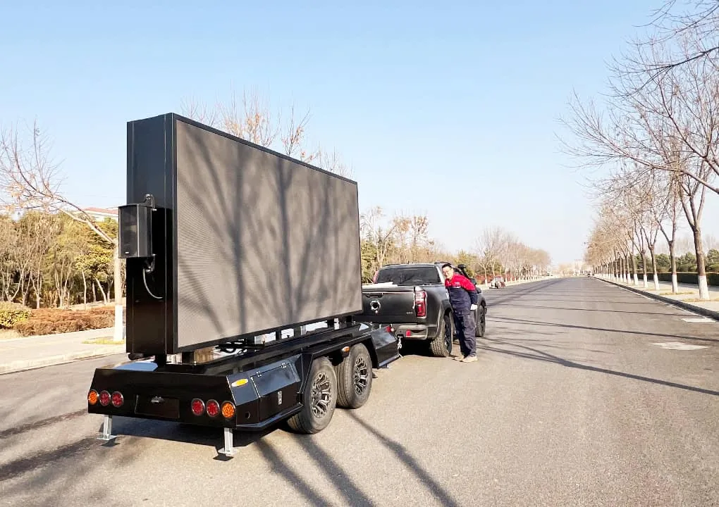MOBO MB-7D LED screen trailer showing video on both screen faces at once