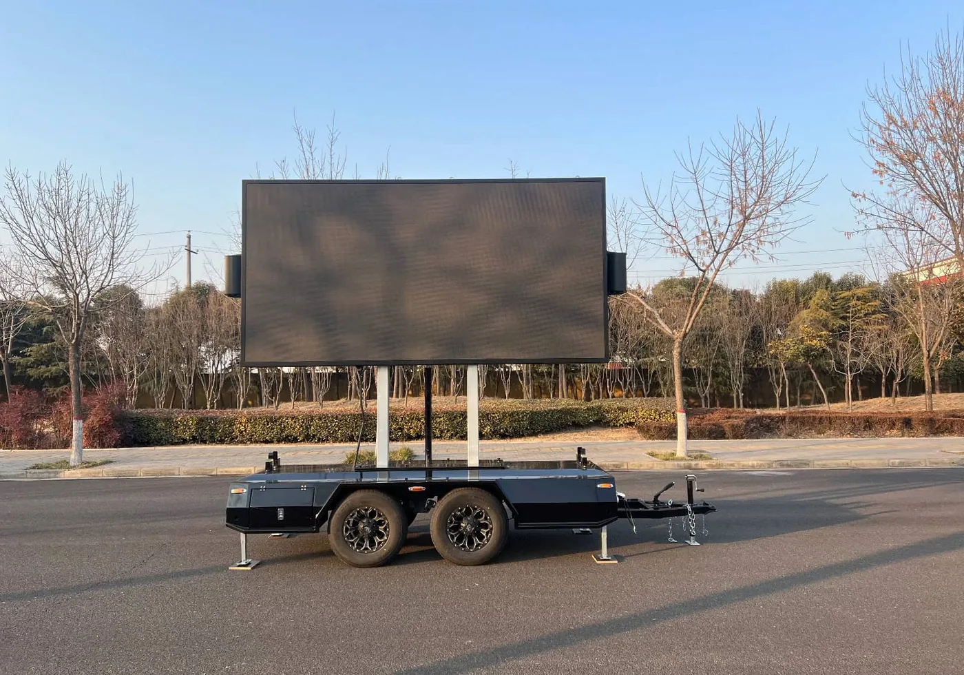 MOBO MB-7D LED screen trailer with the screen raised on its hydraulic mast